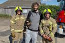 Rescue - Small dog Bella with her owner and hero firefighters