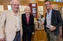 Heather View residents Pam Bale and Daniel Skinner presented the food items to Reverend Steve Rees at All Saints Church