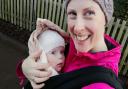 Tess Torjussen, who is taking on the walking challenge to help deaf children, with her baby son Lucas