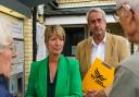 Pippa Heylings and South Cambs district councillor Brian Milnes talking to concerned residents at Shelford station