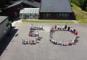 The aerial photo of pupils celebrating the school's 50th anniversary