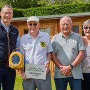 Stonebond developers donated a defibrillator to Melbourn Bowls Club