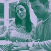 Woman and man with laptop