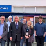 L-R: Chair of trustees Darren Coyle, energy adviser Tom Hogan, Sir Oliver, Ian Allott Advice team leader, Lecia Fraser head of advice services, Harry Hensby kickstart community engagement assistant, Simon Hales debt relief order adviser