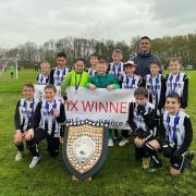 Royston's King James Academy U11 boys celebrate winning the Wix Shield. Picture: KJA