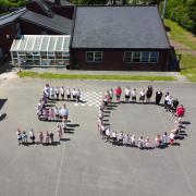 The aerial photo of pupils celebrating the school's 50th anniversary