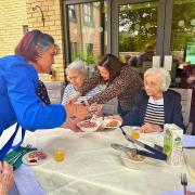 Residents enjoying the picnic at Melbourn Springs Care Home