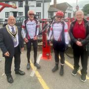 Mayor Cllr John Rees and Cllr Mike Harrison with members of Royston Cycling Club at the new repair stand