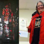 Jo Brown with her winning painting 'Red Lanterns'