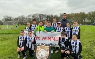 Royston's King James Academy U11 boys celebrate winning the Wix Shield. Picture: KJA