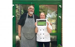 Birute and Petru at Southwell Court with their food hygiene certificate