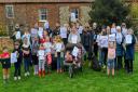 Families at the end of their march to save Brancaster CofE Primary Academy