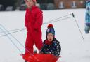 The Dennis family play in the snow in Clarence Park, St Albans. Picture: DANNY LOO