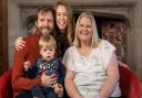 Alex and Claire Martin and their son Robin in Cambridgeshire with Louise Brown (right), the world's first 