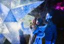 A family enjoys a close up of Supernova