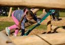 Trying out the new play equipment at Wimpole Estate