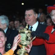 Queen Elizabeth II presents Australia\'s Nick Farr-Jones with the Rugby World Cup in 1991 at Twickenham.