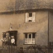 The Hicks family in Mullion Cottage, Church Road, Chrishall celebrating the Silver Jubilee of George V on May 6, 1935