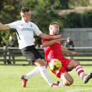 Brandon Adams scored a hat-trick as Royston Town reached the final of the Southern League Challenge Cup.