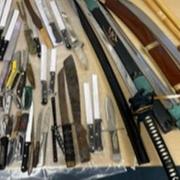 More than 50 weapons including swords, knuckle dusters and batons handed into Cambridgeshire police as part of an amnesty.