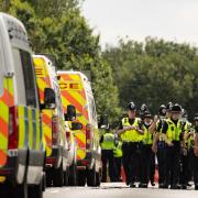 Police attend MBR Acres Protest camp en-masse as protesters report two van loads of puppies leave the site..
A1090, Huntingdon
Tuesday 10 August 2021. 
Picture by Terry Harris.