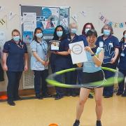 Nurse Carina Cruz hula hooped non-stop for four hours to raise funds for research at the East and North Hertfordshire NHS Trust