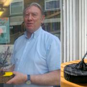 Owner Paul Bowes with the 'Mr Bumbles' sculture and (left) the 'Dance for Joy' sculpture