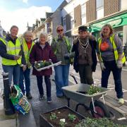 Royston Evening WI Group joined Cllr Elizabeth Freeman and Mayor Cllr Lisa Adams to tidy up the town centre planters