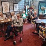 Residents at the cheese and wine night