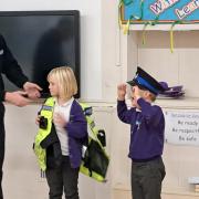 Royston PCSO Chris Brabrook with schoolchildren