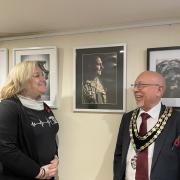 Sarah Haskell and Mayor Cllr John Rees with Sarah's military portrait