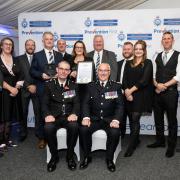 Team of the Year Award: Sitting front Chief Constable Charlie Hall and Deputy Chief Constable Bill Jephson with members of the Hostage and Crisis Negotiator Cadre.