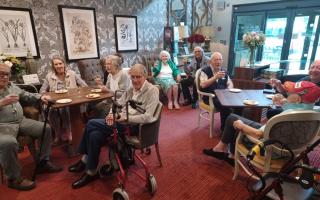 Residents at the cheese and wine night